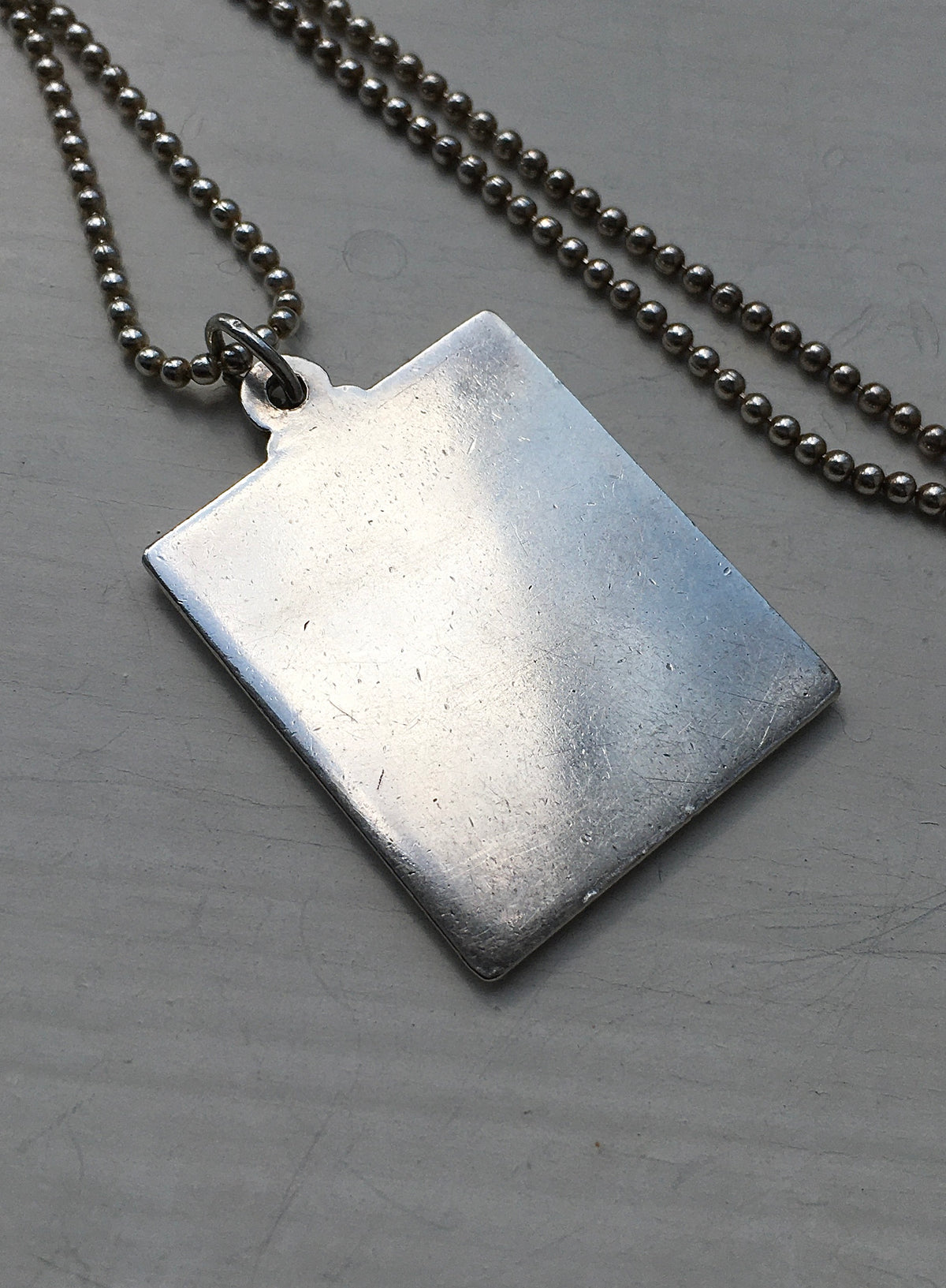Vintage Sterling Silver Stamp Pendant